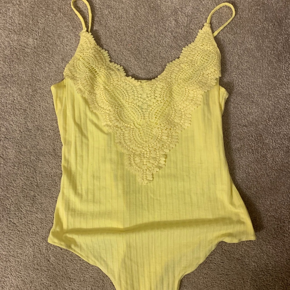 yellow bodysuit